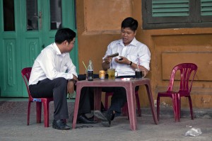 A streetside coffe shop. God knows and hears every day to day concern shared among the people.